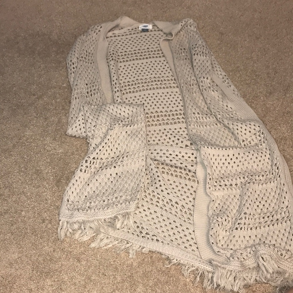Knee Length, Tank Sweater with fringe.
